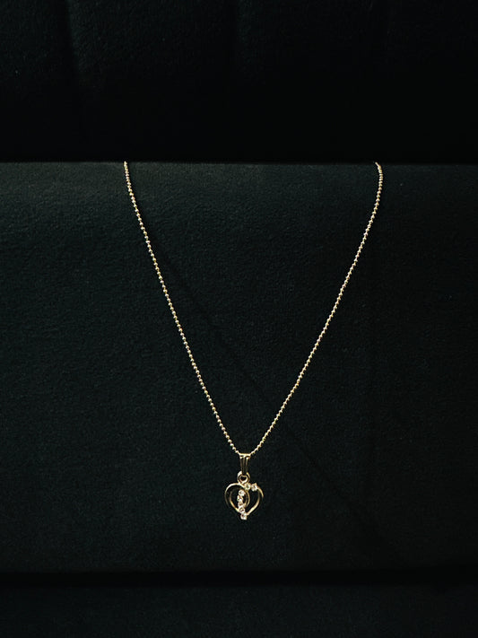 Radiant Heart Gold Pendant Necklace – Elegant & Timeless